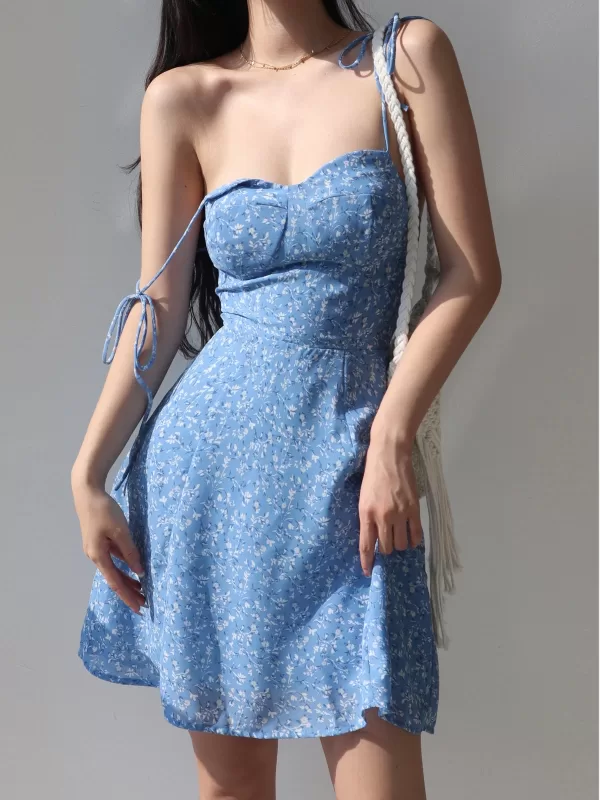 Girl wearing a vintage spaghetti strap Korean dress