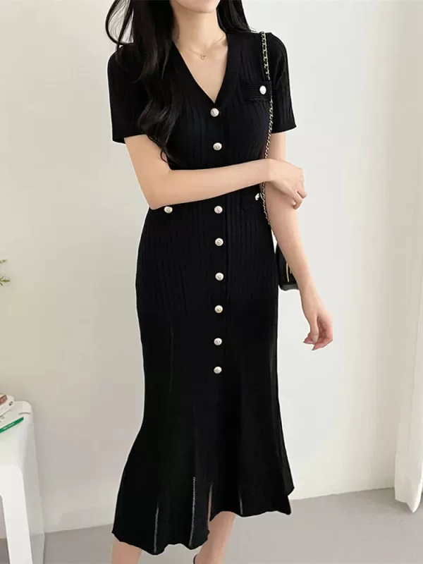 A flattering black knitted midi dress with a bodycon silhouette, perfect for summer.