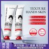 Woman applying kojic acid hand cream at her office desk during work