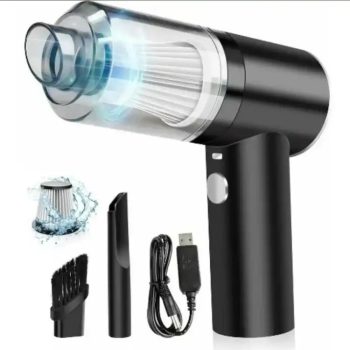 Close-up view of a handheld vacuum showing the built-in LED light illuminating the floor