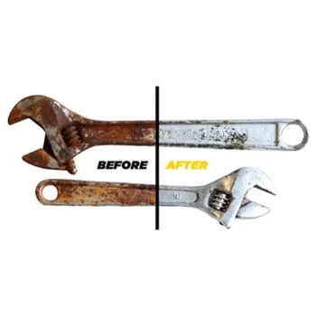 Person using Zang remover spray on a rusty bike chain to restore metal