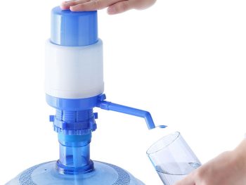 Manual water pump attached to large 19 liter bottle for easy dispensing