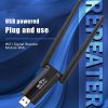 Close-up view of USB WiFi repeater with indicator light