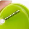 Close-up of spiral vegetable slicer blade Detail of spiralizer cutting mechanism Spiralizer blade