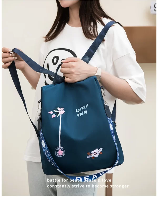 A woman wearing a stylish backpack in a trendy design, perfect for school or everyday use.