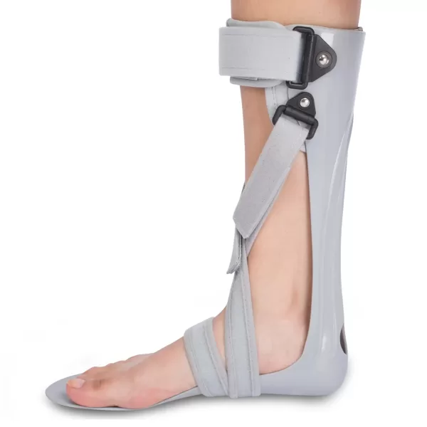 A person with a stroke walks confidently with a Tairibousy AFO Foot Drop Brace on their left leg.