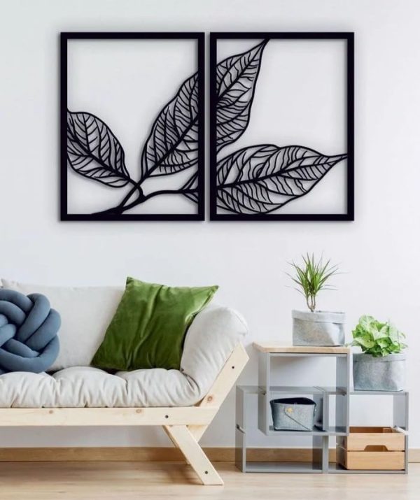 Sleek metal leaves create a modern and sophisticated wall decoration.