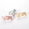 Close-up photo showcasing the Ladybug Charm Ring Set. The image highlights the delicate rings with the ladybug charms in focus.