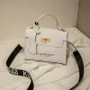 Silver flask in a white leather wrap, ideal for carrying whiskey on the go.