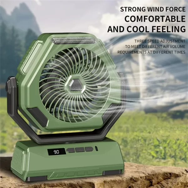 Silver 2024 New Rechargeable Camping Fan standing on a campsite table, blowing cool air and oscillating.