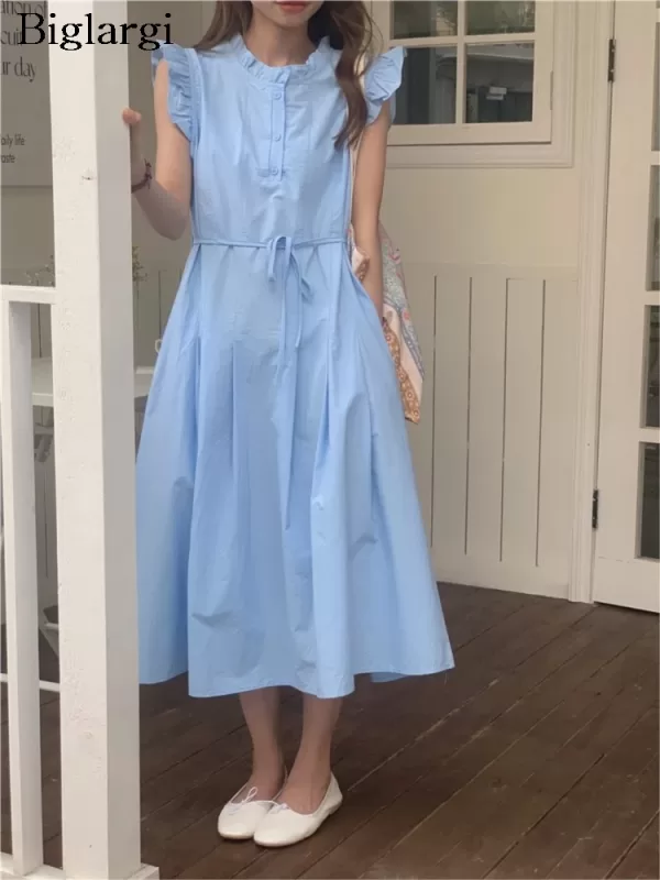 miling girl wearing a flowing summer long dress with ruffles, Korean fashion style 2024.