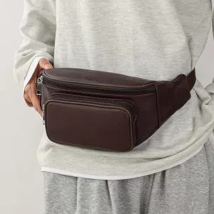 Image of a stylish man wearing a 100% Genuine Leather Men's Waist Bag