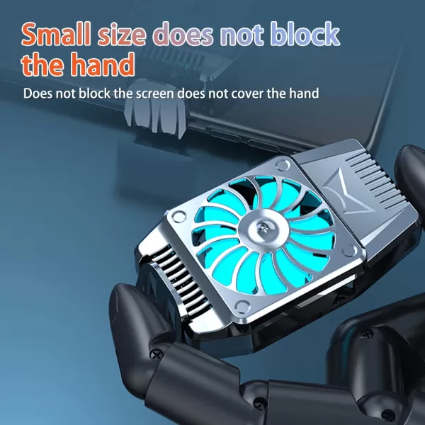 A black H15 Universal Mini Mobile Phone Cooling Fan attached to the back of a silver smartphone in landscape mode. The phone is being held in a person's hand.