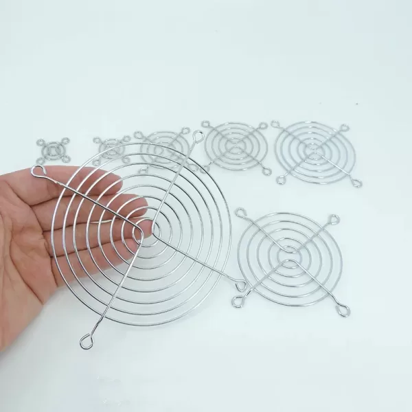 Dust buildup on a CPU fan with arrows pointing to the blocked areas