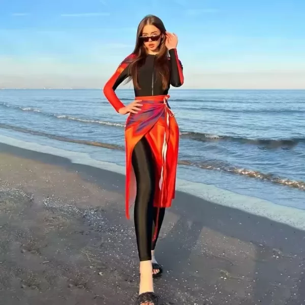 Close-up of a colorful, patterned Burkini top with long sleeves.