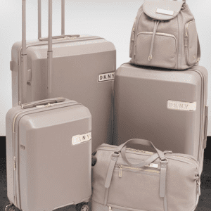 A neatly packed packing bag showcasing various compartments filled with colorful Pakistani clothing