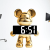 Energy-efficient digital clock with temperature display