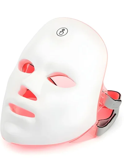 White LED facial beauty mask with red illuminated eye, nose, and mouth cutouts, a touch sensor icon on the forehead, and adjustable side straps against a white background.
