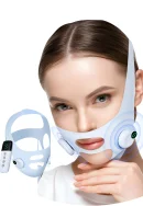 Light blue electric V-face lifting mask strap with wireless remote controller and digital display screen worn by a woman