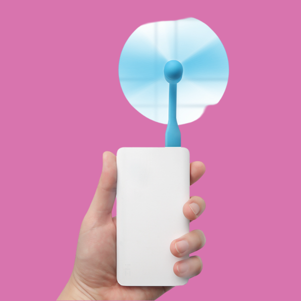 Compact and portable mini USB fan for cool and refreshing air.