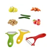 Three colorful ceramic peelers (green, yellow, red) with various fruits and vegetables.