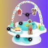 Baby seated in Baby Einstein 3-in-1 activity seat with lights, music, and toys (1).
