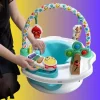Baby seated in Baby Einstein 3-in-1 activity seat with lights, music, and toys (3).