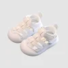 Soft PU leather baby shoes sandals for 0–3 years, white and black colors, perfect for first steps and summer outings (1).
