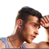 Boean Bluetooth wireless headphones on a gym towel next to a water bottle (2).