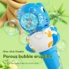 Child playing with dinosaur bubble gun toy that blows bubbles and lights up outdoors (3).