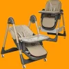 Baby sitting in a raised foldable dining chair at the table (3).