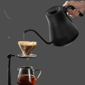 Matte black INTASTING gooseneck electric kettle with precision spout on a kitchen counter (3).