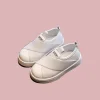 White, black, and gray slip-on canvas shoes sneakers for toddlers and kids (1).