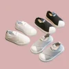 White, black, and gray slip-on canvas shoes sneakers for toddlers and kids (3).
