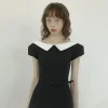 Woman wearing a Korean-style off-shoulder spring dress in a garden (2)
