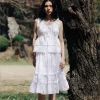 White lace summer skirt with hollow detailing displayed in sunlight (3).