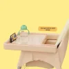 baby dining chair next to a dining table, ideal for home, restaurants, or travel use (1).