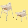 baby dining chair next to a dining table, ideal for home, restaurants, or travel use (3).