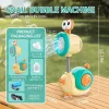 Child playing with a snail-shaped bubble gun shooting glowing bubbles outdoors (3).