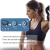 Wireless sport Bluetooth earbuds with LED case resting on a gym bench, designed for workouts and running (2).