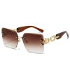 Black Helena oval sunglasses with gradient lenses and UV protection. Retro style women's eyewear.